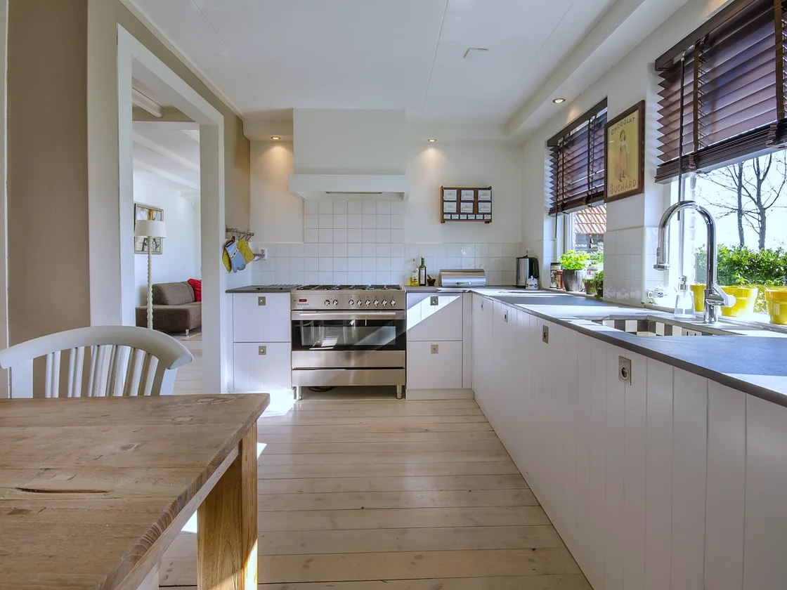 Kitchen at Ashcombe Hill House with a run of units under an east window