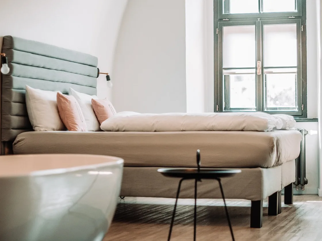 North-facing second bedroom at 14 Mercer Row, lit only by diffuse skylight